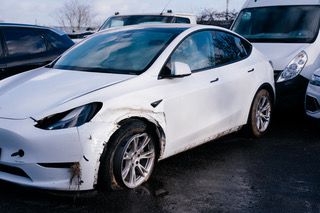 Carrosserie Tesla - Entretien et r&eacute;paration dans notre garage agr&eacute;&eacute; &agrave; Rennes